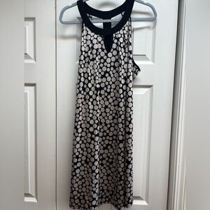 Light weight dress.Keyhole front with open back slats.Polka Dot Patterned Fabric